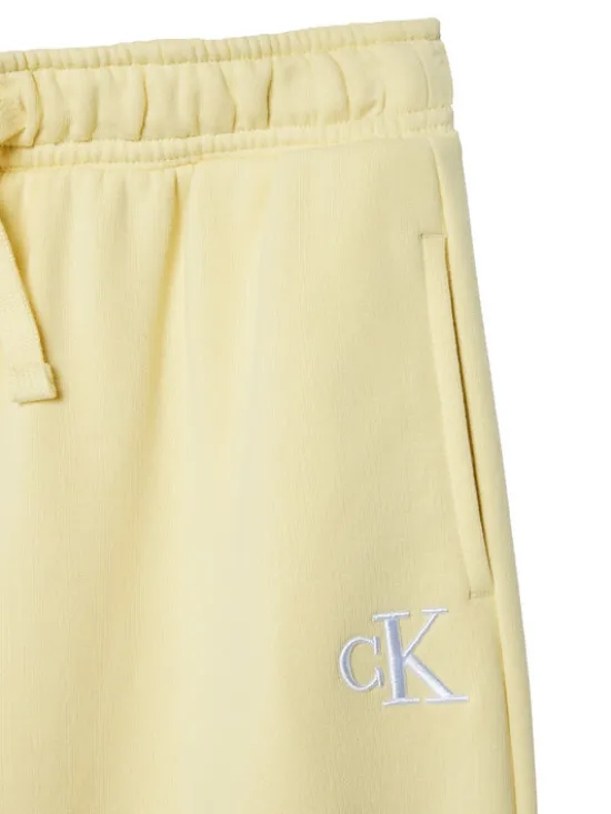 Calvin Klein Jeans Spodnie dresowe LVCKSJC11G Żółty Wide Leg