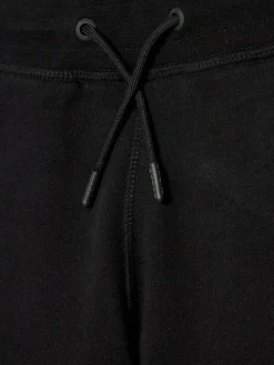 Guess Spodnie dresowe L2YQ46 KAIJ1 Czarny Regular Fit